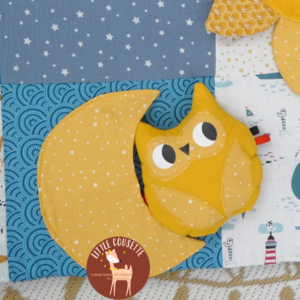 tapis éveil montessori avec doudou hochet